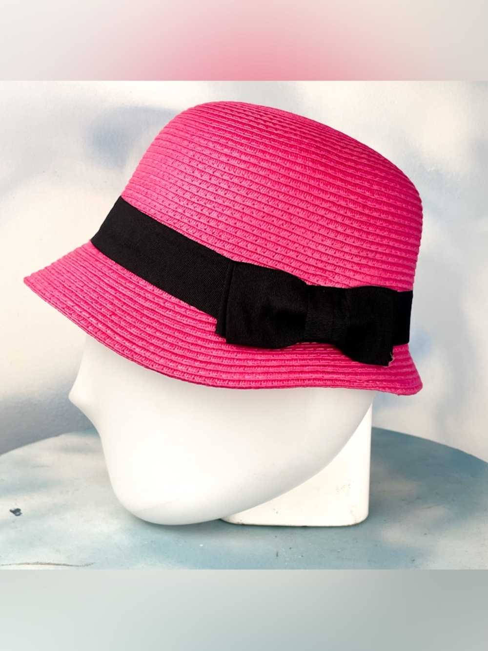 Hot pink woven paper straw cloche hat